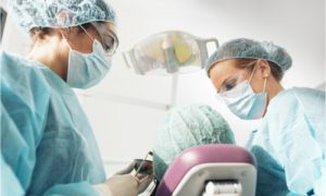 dentists performing oral surgery