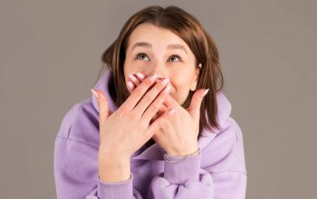why do my gums hurt after drinking alcohol